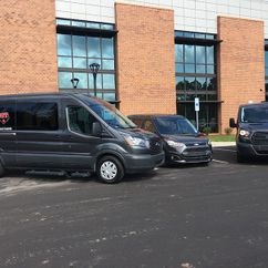 side shot of 3 vans